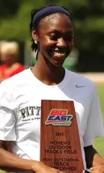 Cambrya Jones holds her award after the meet.