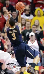 Cameron Wright goes to the basket for a layup.