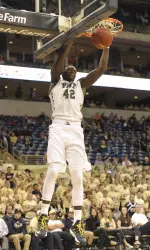 Senior Talib Zanna dunks down two of his 14 points in a 96-60 defeat of Slippery Rock Friday night.