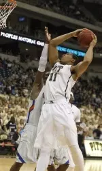 Derrick Randall shoots against Savannah State guard. Charles LeClaire-USA TODAY Sports