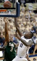 Dante Taylor shoots over South Florida's Zach LeDay.