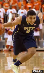 James Robinson (0) drives to the basket