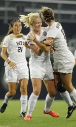 Roosa Arvas, Ashley Moreira and Carly Seneca celebrate Arvas' game-winning header goal in the 86th minute.