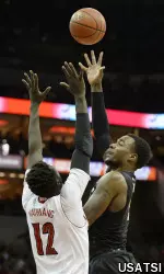 Michael Young (2) shoots the ball during the first half.