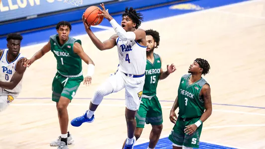 Gerald Drumgoole, Jr. driving the lane against Slippery Rock.