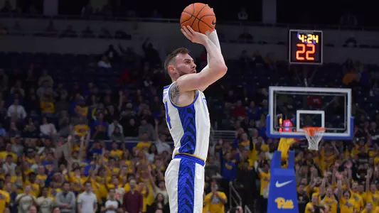 Ryan Murphy shooting a three pointer.