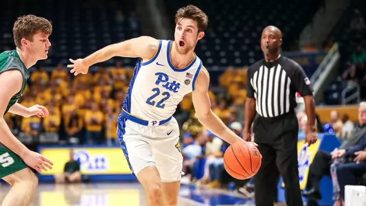 Anthony Starzynski dribbling against Slippery Rock.