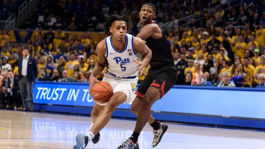 Au'diese Toney driving to the basket against Nicholls State.
