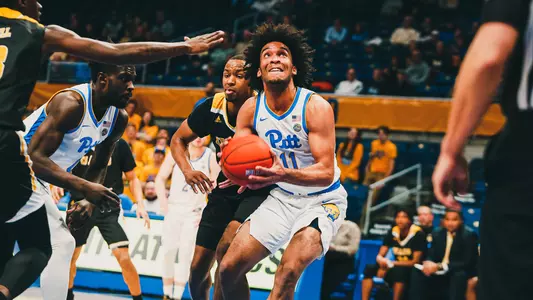 Justin Champagnie gathering the ball against Arkansas Pine Bluff.