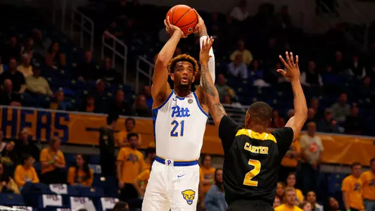Terrell Brown shooting over a defender against Arkansas Pine Bluff.