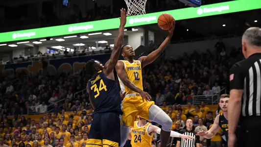 Abdoul Karim Coulibaly attempting a layup against West Virginia.