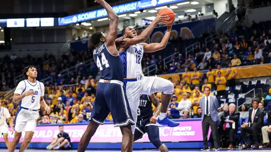 Abdoul Karim Coulibaly attempting a layup against Monmouth.
