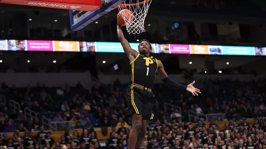 Xavier Johnson dunking.