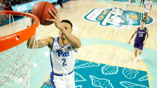 Trey McGowens dunking against Northwestern.