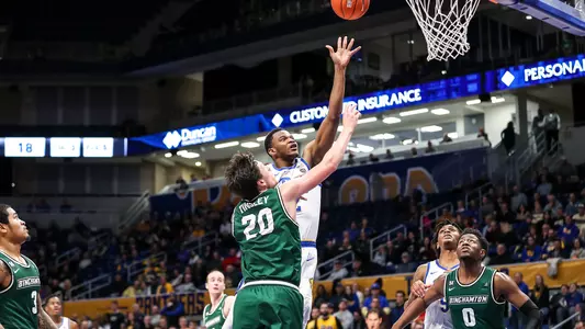 Abdoul Karim Coulibaly shooting over a Binghamton defender.