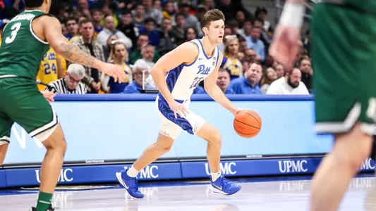 Anthony Starzynski dribbling against Binghamton.