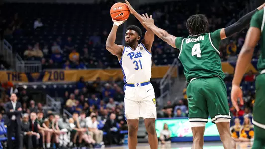 Onyebuchi Ezeakudo shooting against Binghamton.