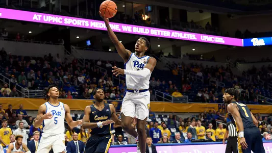 Xavier Johnson attempting a layup against Canisius.