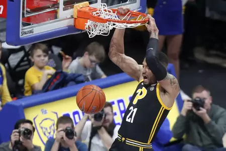Pittsburgh's Terrell Brown dunks against Clemson during the first half of an NCAA college basketball game Wednesday, Feb. 12, 2020, in Pittsburgh. (AP Photo/Keith Srakocic)