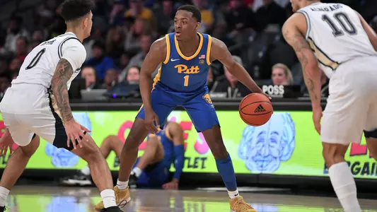 Xavier Johnson dribbling against Georgia Tech.