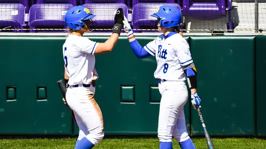 Hunter Levesque and Kayla Lane high fiving.
