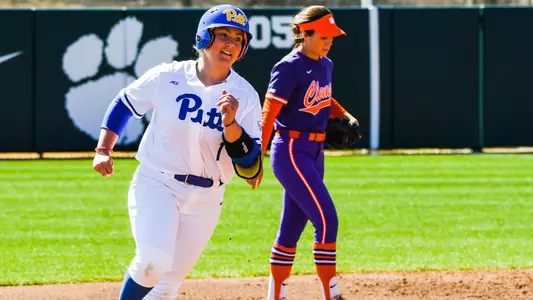 Connor McGaffic rounding third at Clemson