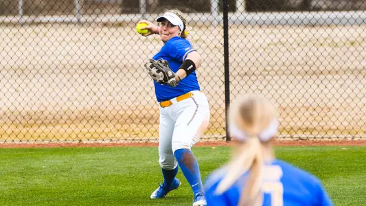 Connor McGaffic throwing the ball at Furman