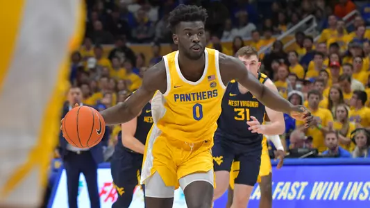Eric Hamilton dribbling against West Virginia.
