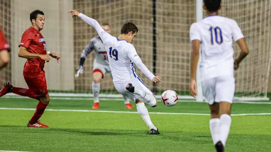 Veljko Petkovic taking a shot against Louisville.