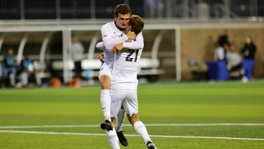 Veljko Petkovic, Filip Mirkovic celebrating against Louisville.