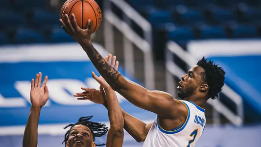 Femi Odukale attempting a layup vs. Miami.