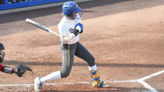 Kayla Lane batting vs. Louisville.