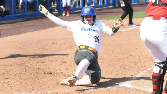 Morgan Batesole sliding into home vs. Louisville.