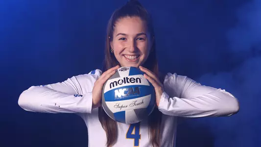 COLUMBUS, OH - DECEMBER 15: The Pittsburgh Panthers pose during the Division I Women’s Volleyball Championship on December 15, 2021 in Columbus, Ohio. (Photo by Jamie Schwaberow/NCAA Photos via Getty Images)