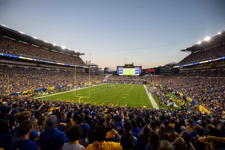 A wide shot of Acrisure Stadium from the stands during the Backyard Brawl at twilight