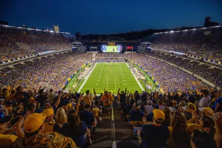 A wide shot of Acrisure Stadium from the stands during the Backyard Brawl at dusk