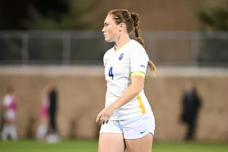 Ellie Coffield in White Uniform