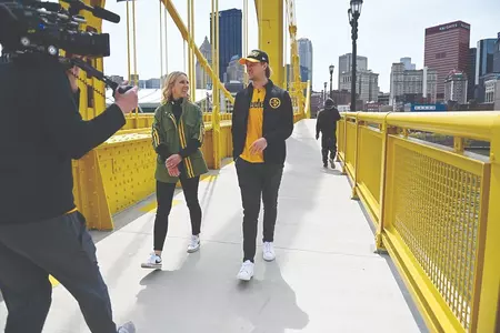 Missi Matthews and Kenny Picket walk during an interview