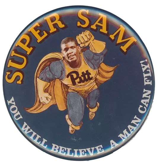 A pin showing Sam Clancy as a superhero