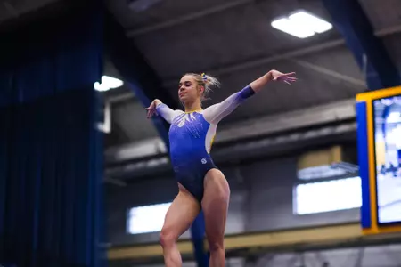 Hallie Copperwheat on beam