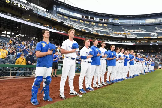 Pitt basbeall players stand at attention for the national anthem at PNC park