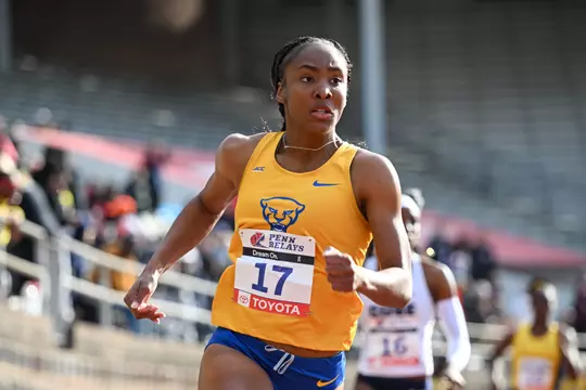 Logan Neely runs at Penn Relays