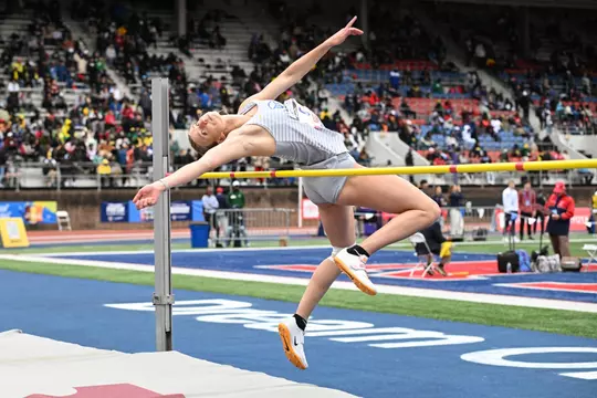 Lydia Bottelier mid jump at Penn Relays