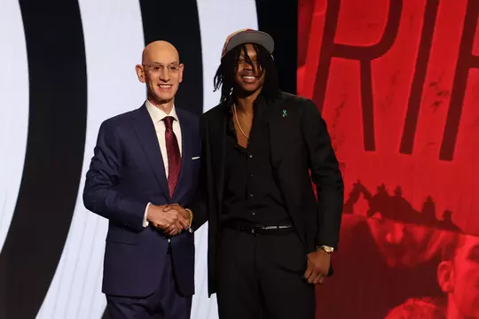 Jun 26, 2024; Brooklyn, NY, USA; Carlton Carrington poses for photos with NBA commissioner Adam Silver after being selected in the first round by the Portland Train Blazers in the 2024 NBA Draft at Barclays Center. Mandatory Credit: Brad Penner-USA TODAY Sports
