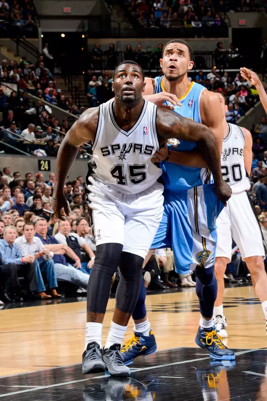 SAN ANTONIO, TX - MARCH 27: DeJuan Blair #45 of the San Antonio Spurs battles for rebound position against JaVale McGee #34 of the Denver Nuggets on March 27, 2013 at the AT&T Center in San Antonio, Texas. NOTE TO USER: User expressly acknowledges and agrees that, by downloading and or using this photograph, user is consenting to the terms and conditions of the Getty Images License Agreement. Mandatory Copyright Notice: Copyright 2012 NBAE (Photos by D. Clarke Evans/NBAE via Getty Images)