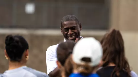 Allen Greene speaks to a team
