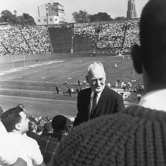 Doc Carlson scales the steps at Pitt Stadium