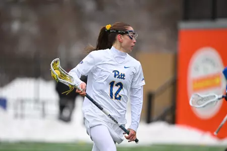 WLAX 26 Comello
