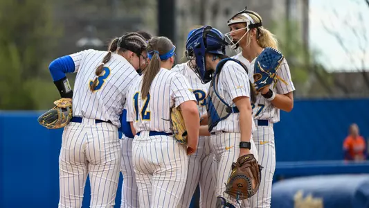 Action Shot of Team Huddle