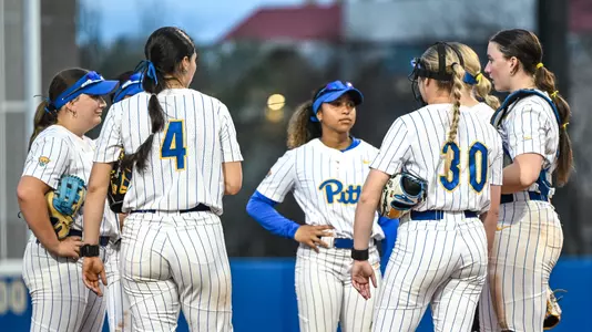 Action Shot of Team Huddle